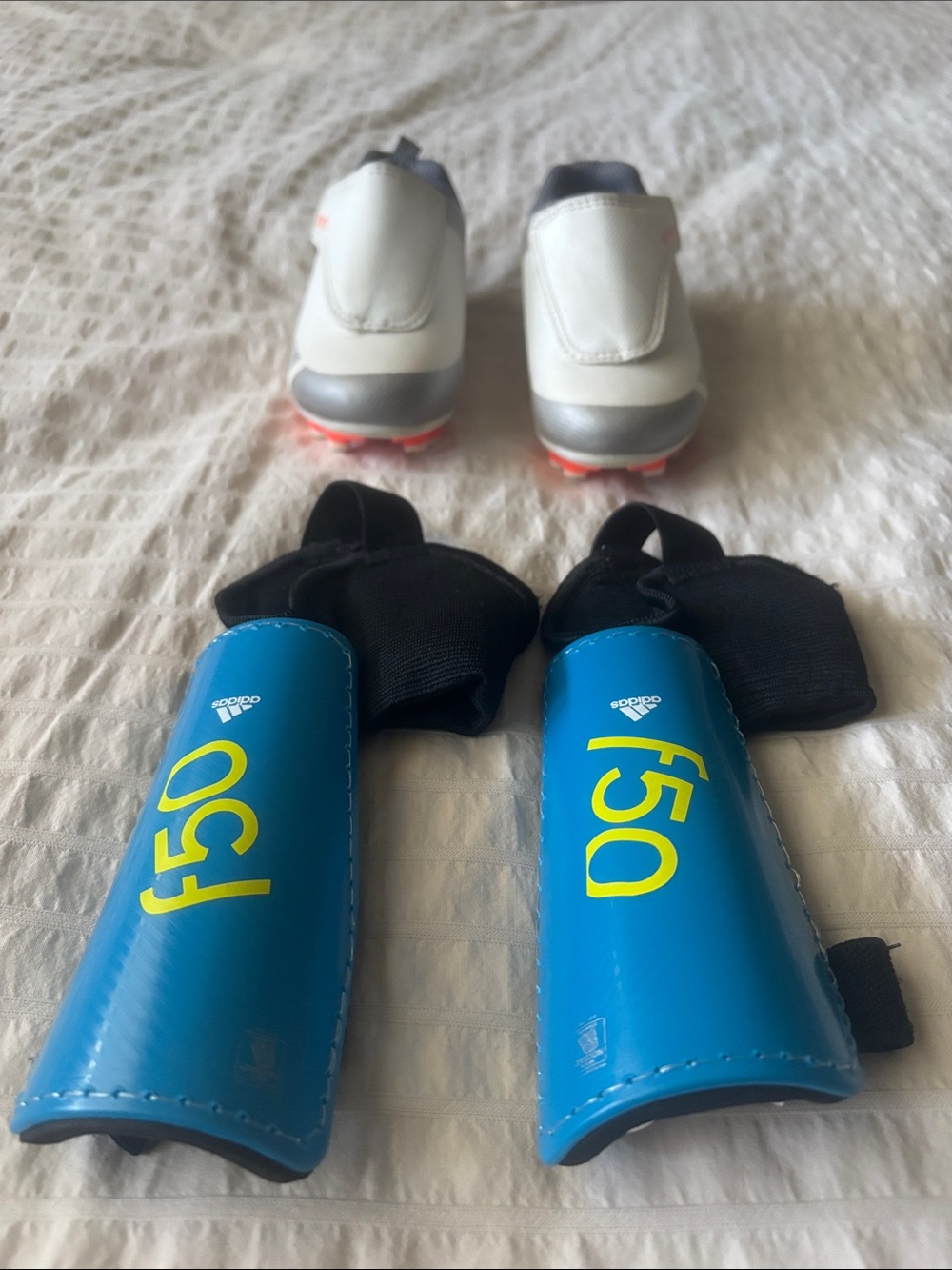Toddler Kids Soccer Cleats in White and Gray with Blue Adidas Shinguards - Picture 9 of 10
